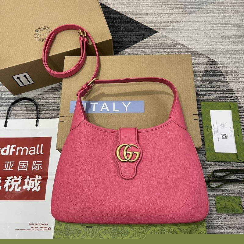 G*u*i top handle bags